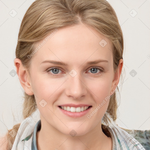 Joyful white young-adult female with medium  brown hair and blue eyes