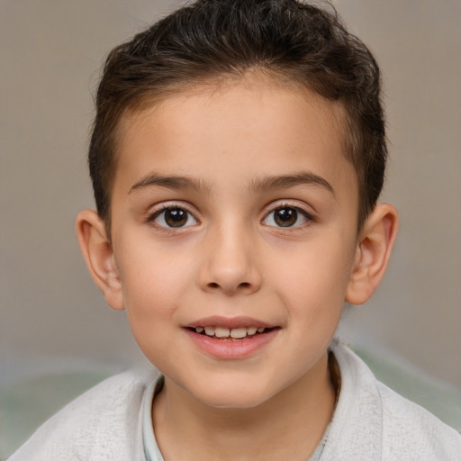 Joyful white child female with short  brown hair and brown eyes