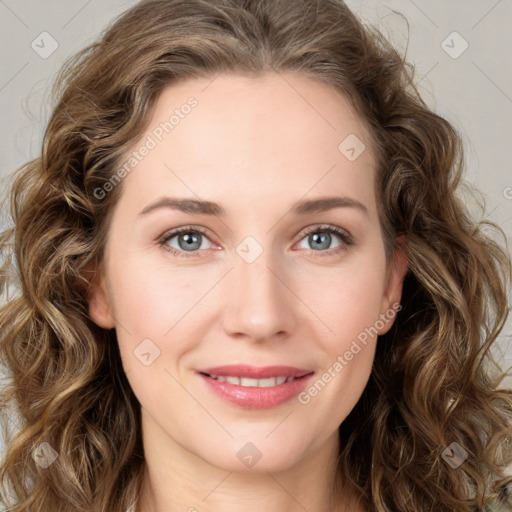 Joyful white young-adult female with long  brown hair and green eyes