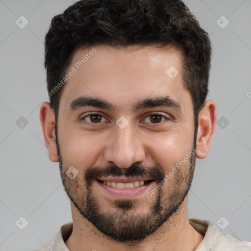 Joyful white young-adult male with short  black hair and brown eyes