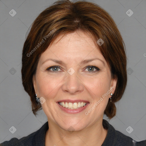 Joyful white adult female with medium  brown hair and grey eyes