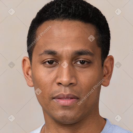 Neutral latino young-adult male with short  black hair and brown eyes