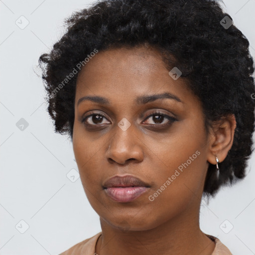 Neutral black young-adult female with short  black hair and brown eyes