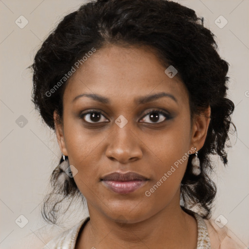 Joyful black young-adult female with medium  brown hair and brown eyes