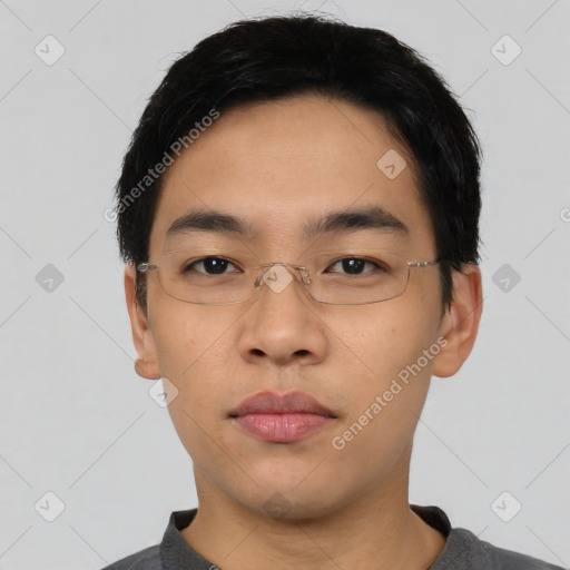 Neutral asian young-adult male with short  black hair and brown eyes