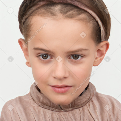 Joyful white child female with short  brown hair and brown eyes