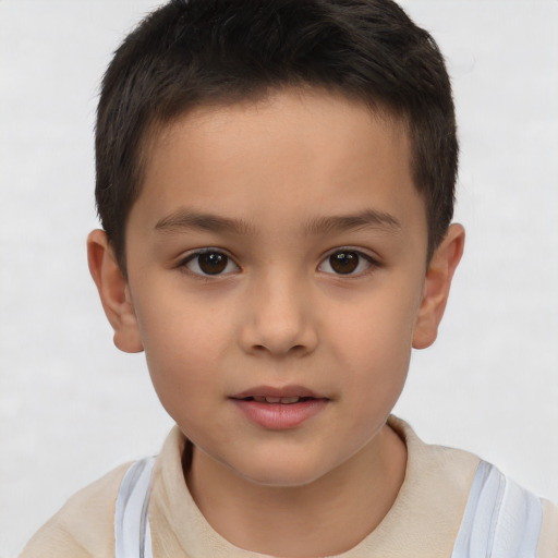 Joyful white child male with short  brown hair and brown eyes