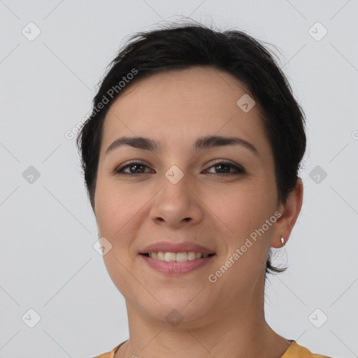 Joyful white young-adult female with short  brown hair and brown eyes