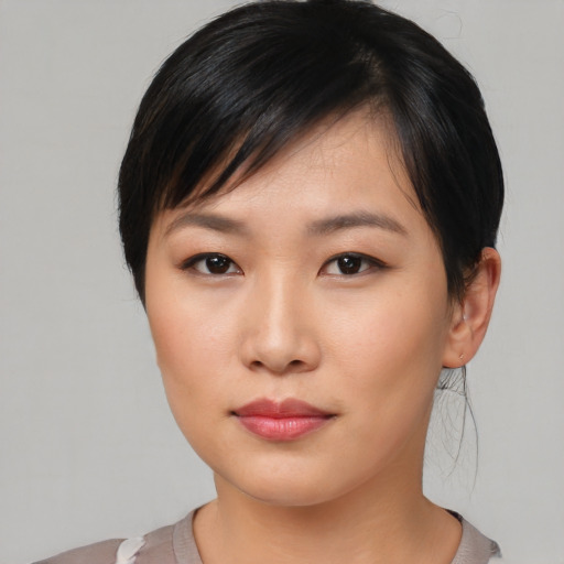 Neutral asian young-adult female with short  brown hair and brown eyes