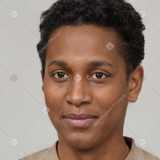 Joyful black young-adult male with short  black hair and brown eyes