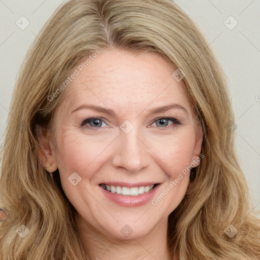 Joyful white young-adult female with long  brown hair and blue eyes