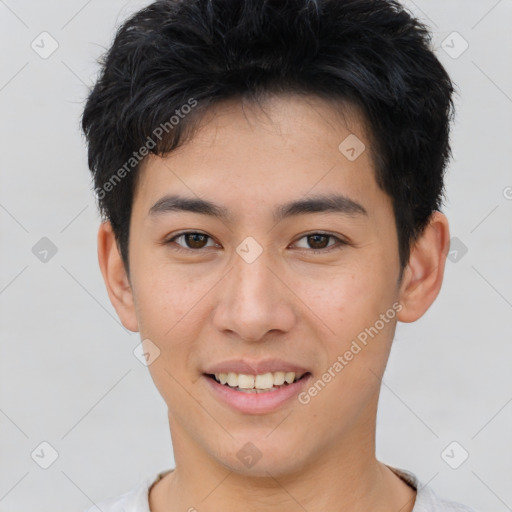 Joyful asian young-adult male with short  brown hair and brown eyes