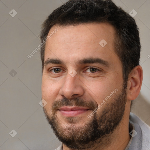 Joyful white adult male with short  brown hair and brown eyes