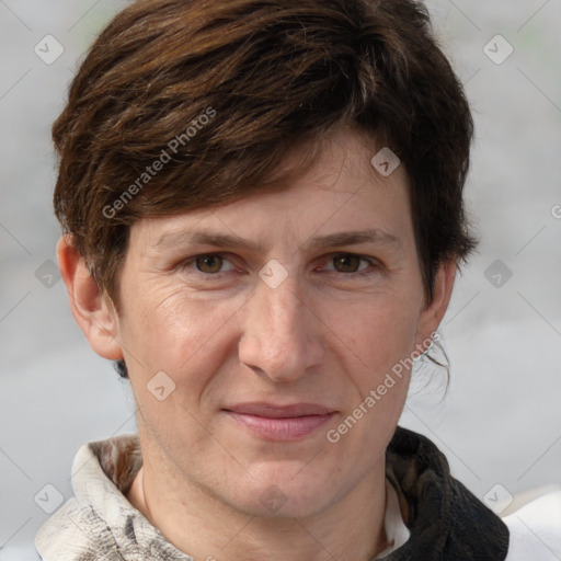 Joyful white adult male with short  brown hair and grey eyes