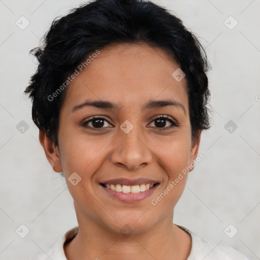 Joyful latino young-adult female with short  brown hair and brown eyes