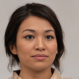 Neutral asian young-adult female with medium  brown hair and brown eyes