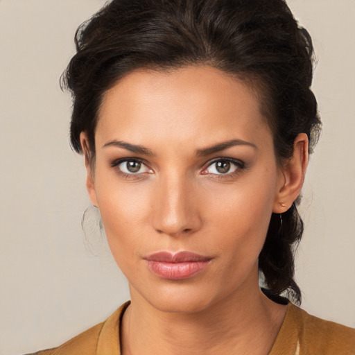 Neutral white young-adult female with medium  brown hair and brown eyes