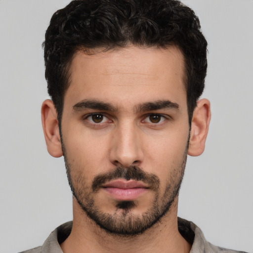 Neutral white young-adult male with short  black hair and brown eyes