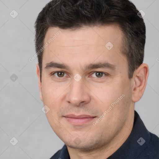 Joyful white adult male with short  brown hair and brown eyes