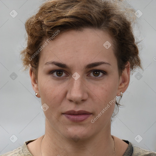 Joyful white adult female with short  brown hair and brown eyes