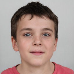 Joyful white child male with short  brown hair and brown eyes