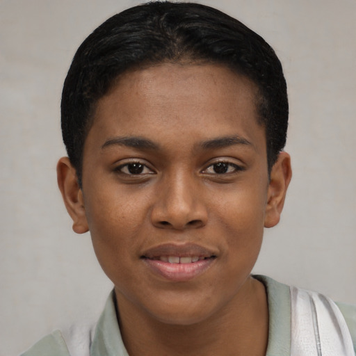 Joyful black young-adult female with short  black hair and brown eyes