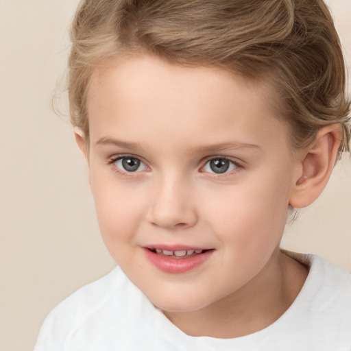 Joyful white child female with short  brown hair and brown eyes