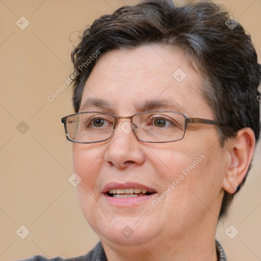 Joyful white adult female with short  brown hair and brown eyes