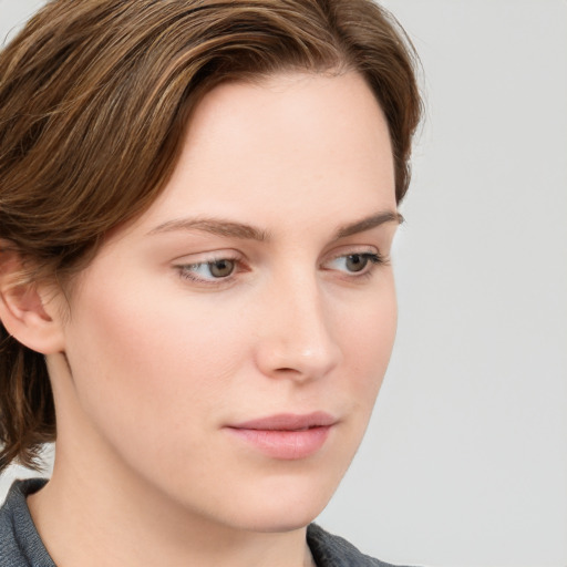 Neutral white young-adult female with medium  brown hair and grey eyes