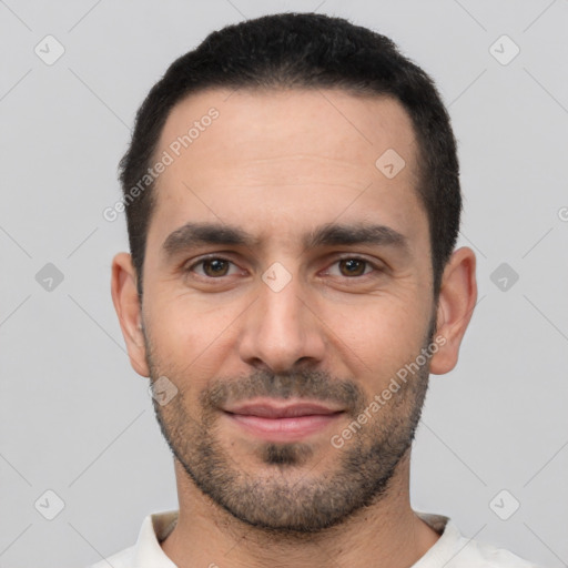 Joyful white young-adult male with short  black hair and brown eyes