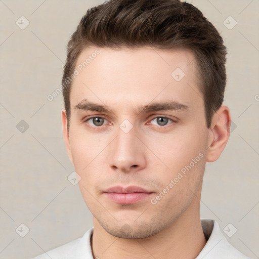 Neutral white young-adult male with short  brown hair and brown eyes