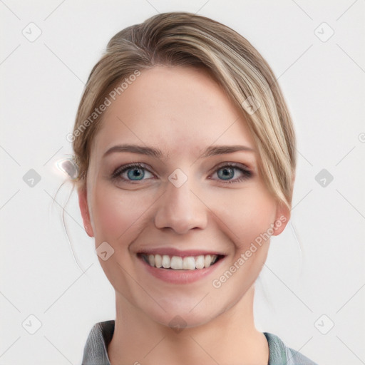 Joyful white young-adult female with medium  brown hair and blue eyes