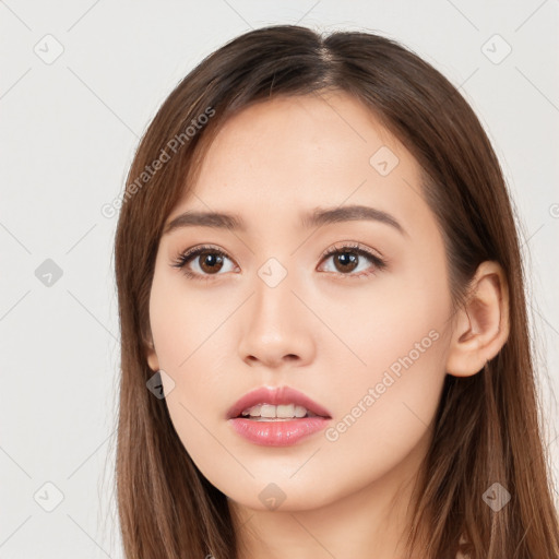 Neutral white young-adult female with long  brown hair and brown eyes