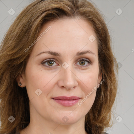 Joyful white young-adult female with long  brown hair and green eyes