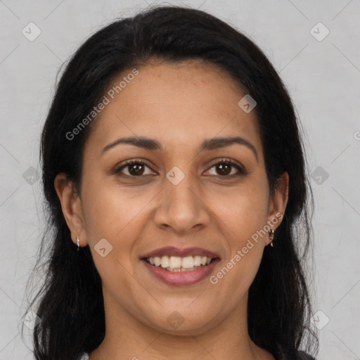 Joyful latino young-adult female with long  brown hair and brown eyes