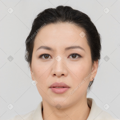 Neutral asian young-adult female with medium  brown hair and brown eyes