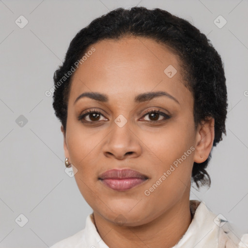 Joyful latino young-adult female with short  black hair and brown eyes