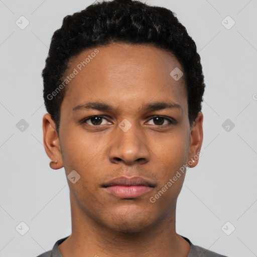 Neutral white young-adult male with short  black hair and brown eyes