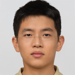 Neutral asian young-adult male with short  brown hair and brown eyes