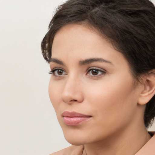 Neutral white young-adult female with medium  brown hair and brown eyes