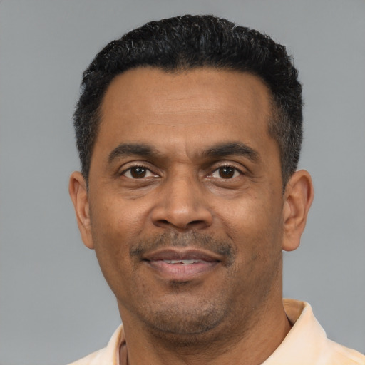 Neutral latino adult male with short  black hair and brown eyes