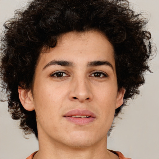 Joyful white young-adult male with medium  brown hair and brown eyes