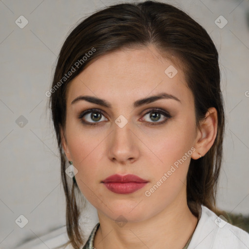 Neutral white young-adult female with medium  brown hair and brown eyes