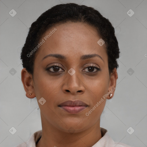 Joyful latino young-adult female with short  brown hair and brown eyes