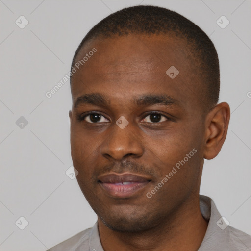 Neutral black young-adult male with short  black hair and brown eyes
