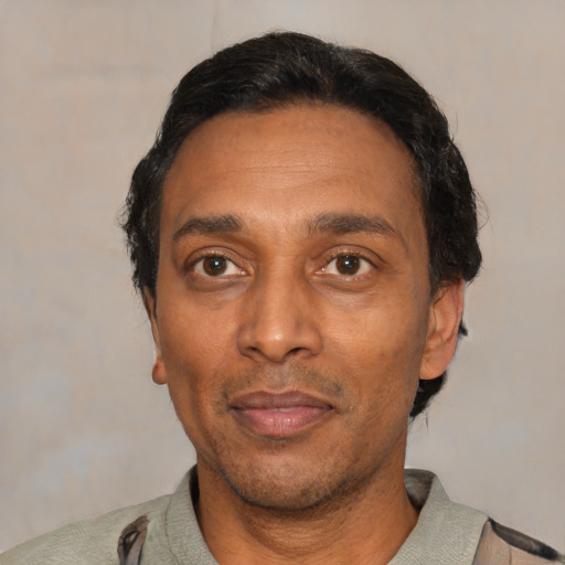 Neutral latino adult male with short  black hair and brown eyes