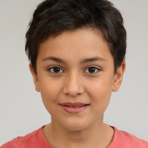 Joyful white child female with short  brown hair and brown eyes