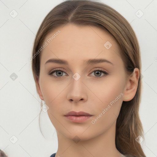 Neutral white young-adult female with long  brown hair and brown eyes