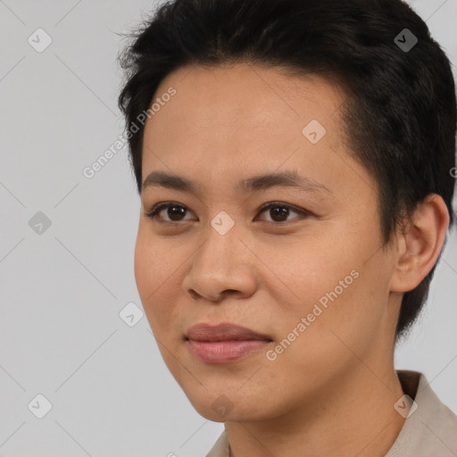 Joyful asian young-adult female with short  black hair and brown eyes