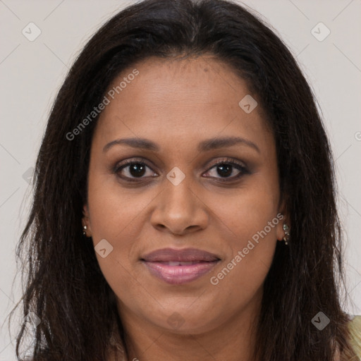 Joyful black young-adult female with long  brown hair and brown eyes